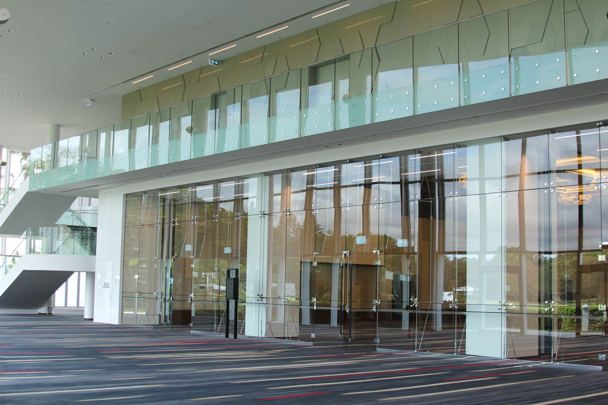 RACV royal pines resort conference events double height glass wall stairs