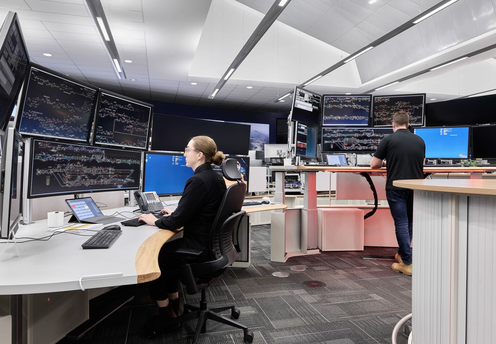 Woman & man at desks