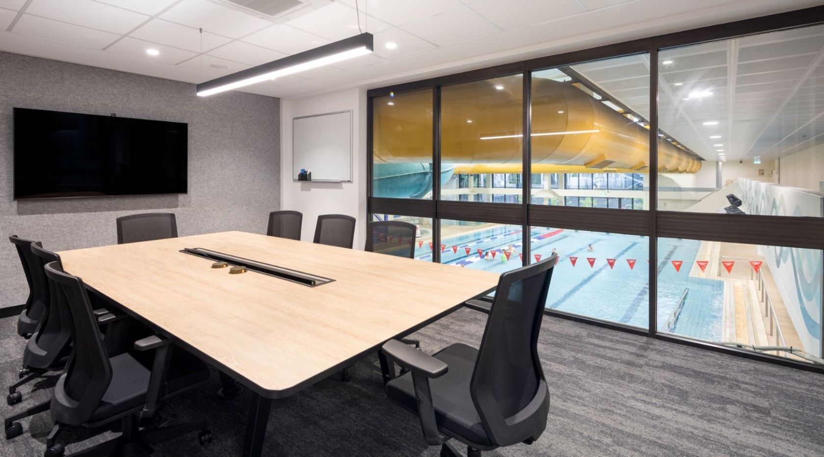 schiavello construction queensland brisbane aquatic centre sleeman sports complex refurbishment entering complex meeting room