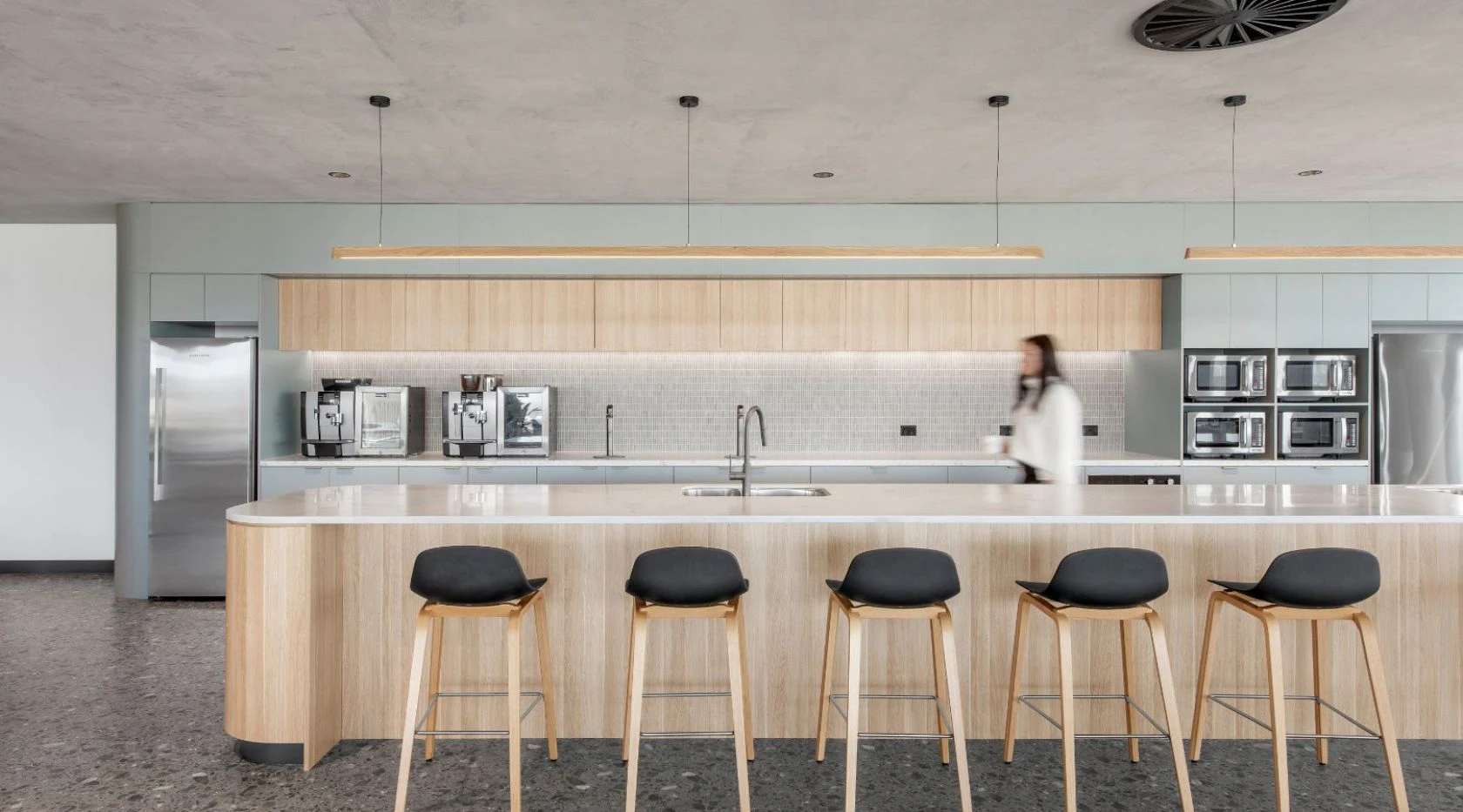 indoors, interior design, kitchen, bar stool, furniture, device, electrical device, microwave, oven, person