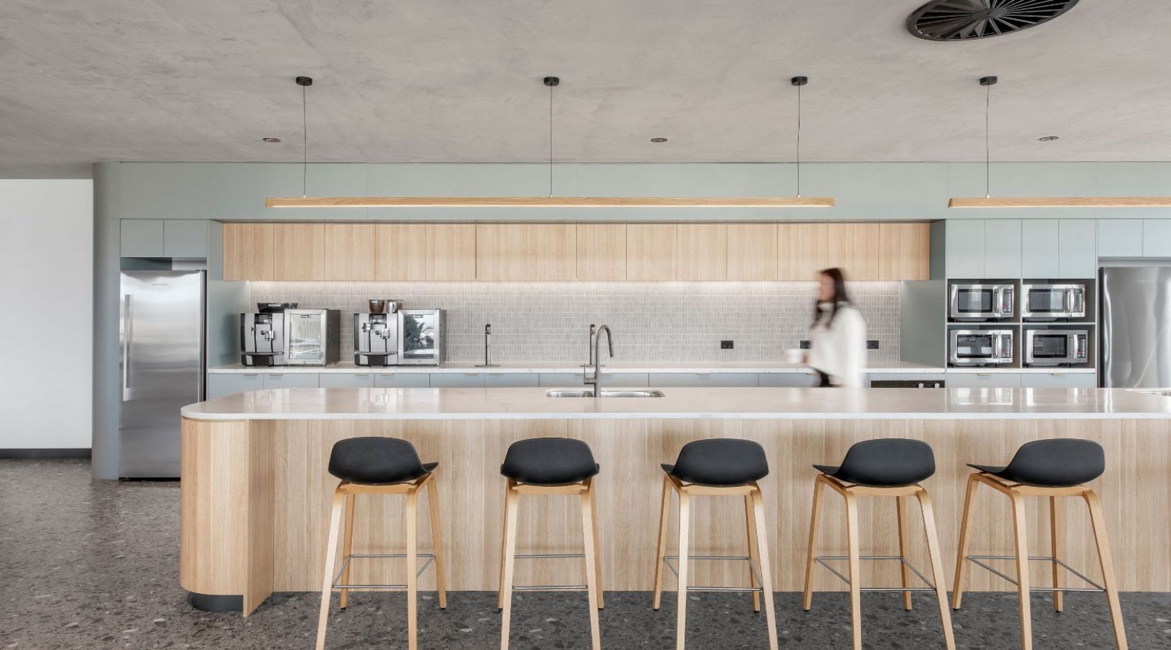 indoors, interior design, kitchen, bar stool, furniture, device, electrical device, microwave, oven, person