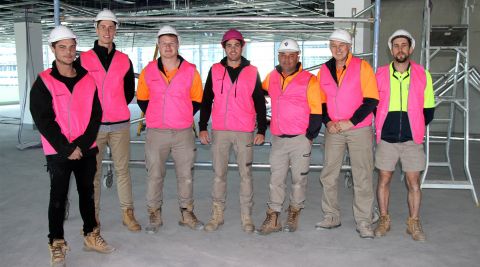 hardhat, helmet, people, person, vest, lifejacket, worker, groupshot, adult, man