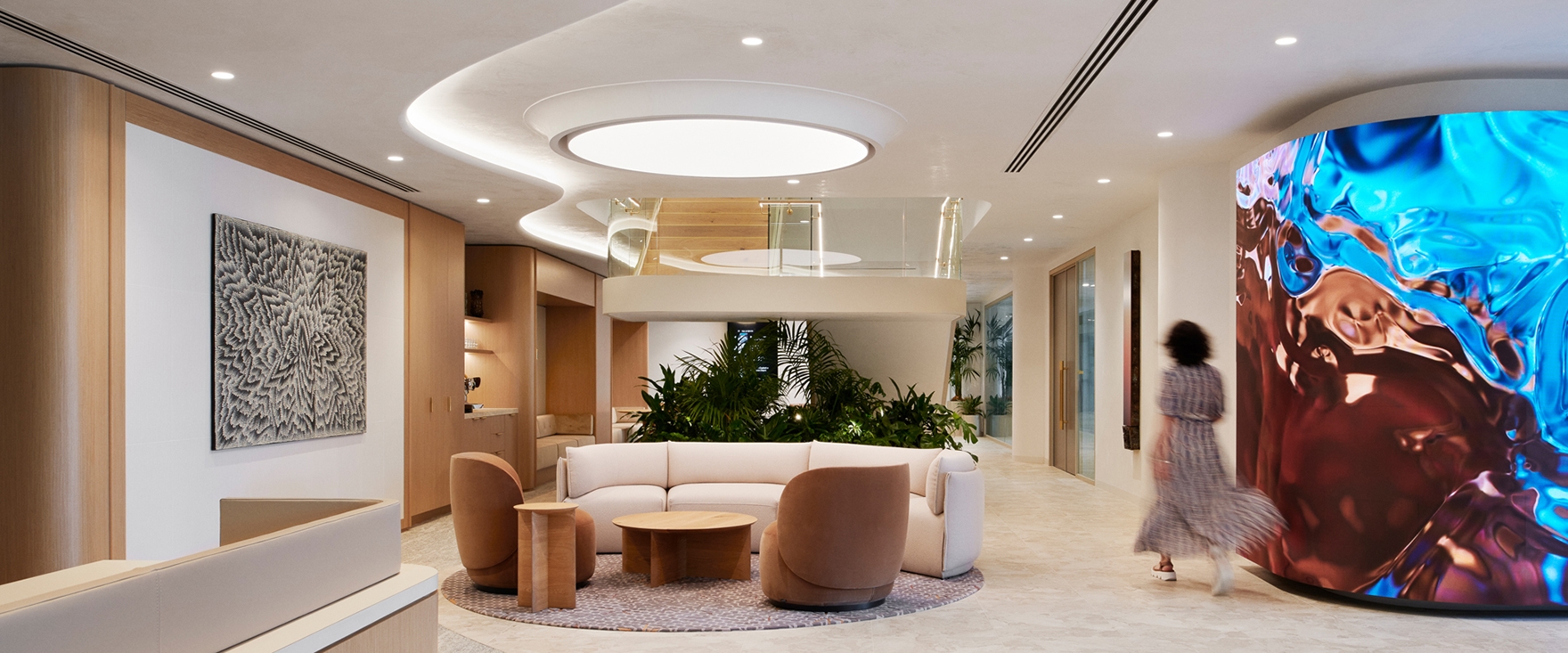 indoors, living room, reception, reception room, couch, ceiling light, person, foyer, table, rug